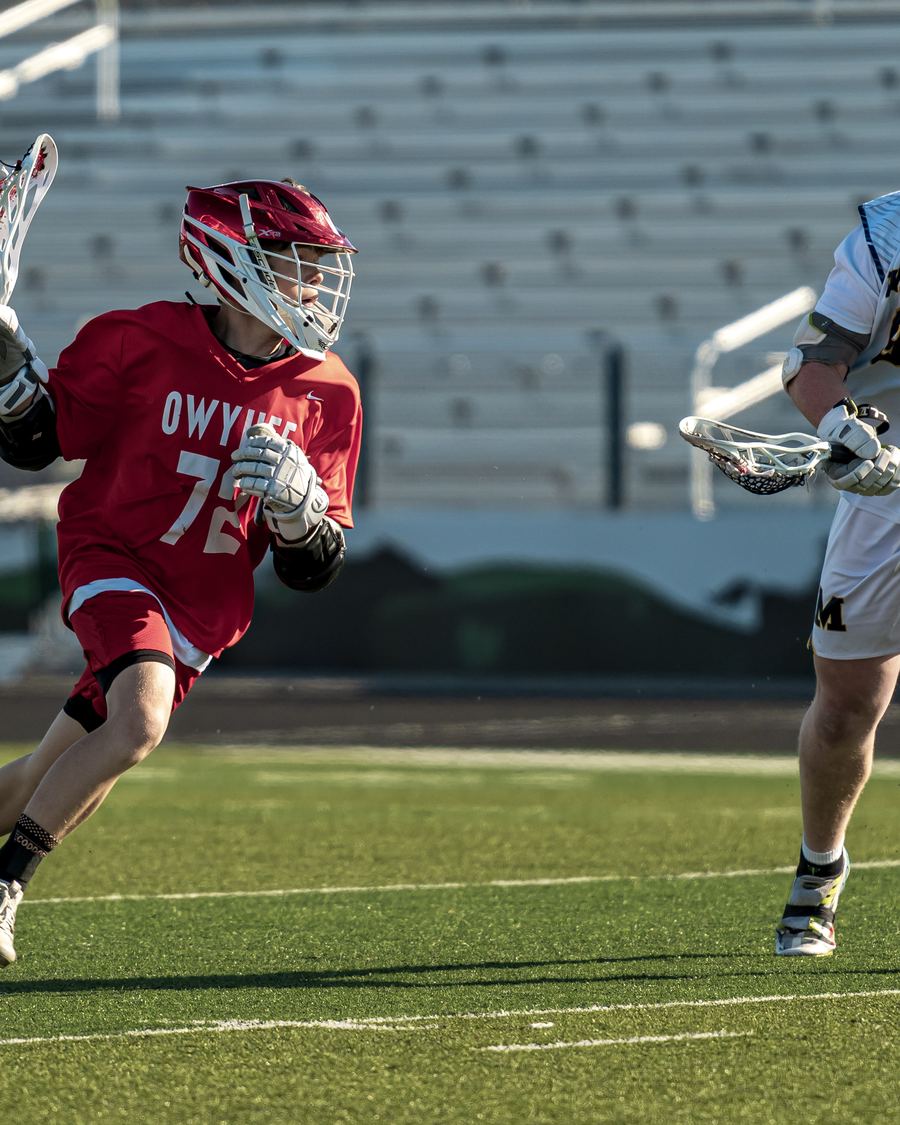 Owyhee vs Eagle — lacrosse game action